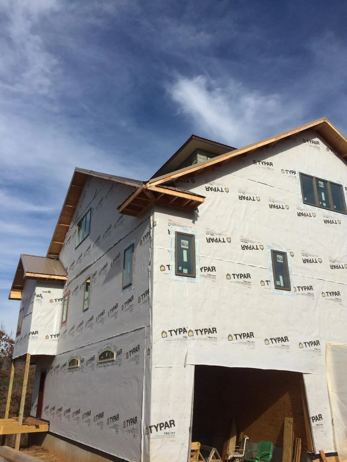 Stick built house wrapped in Typar with new roof framing and dormers in Beaverton